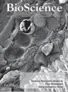 Integrating the Effects of Ocean Acidification across Functional Scales on Tropical Coral Reefs
